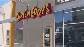 Woman hands couple a baby in Hollywood