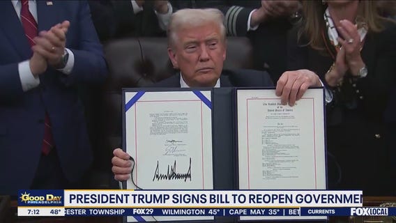 Trump signs bill ending historic government shutdown
