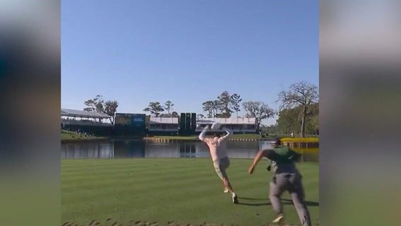Alejandro Tosti celebrates hole in one