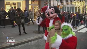Costumed characters move from Times Square to Rockefeller Center