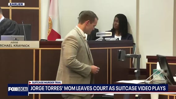 Jorge Torres' mom leaves as suitcase video plays