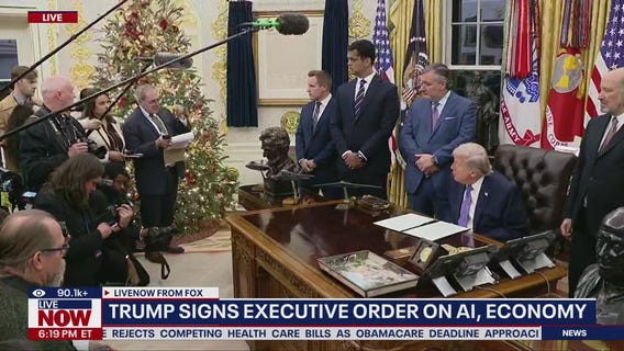 President Trump signs executive orders in Oval Office