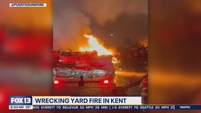 Wrecking yard fire burns in Kent, WA