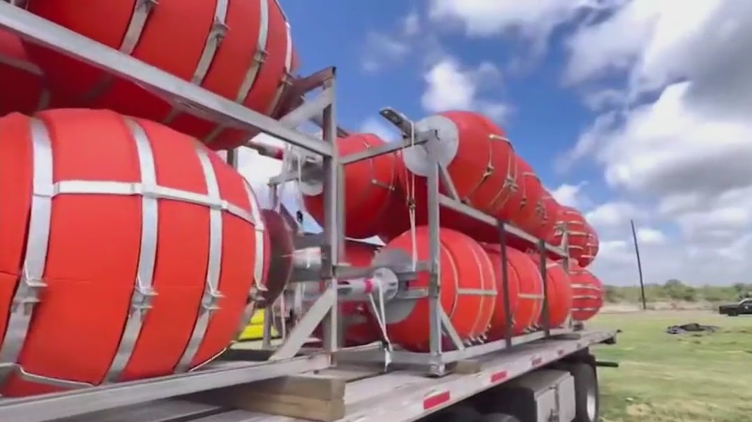 Biden sues Abbott over floating border wall