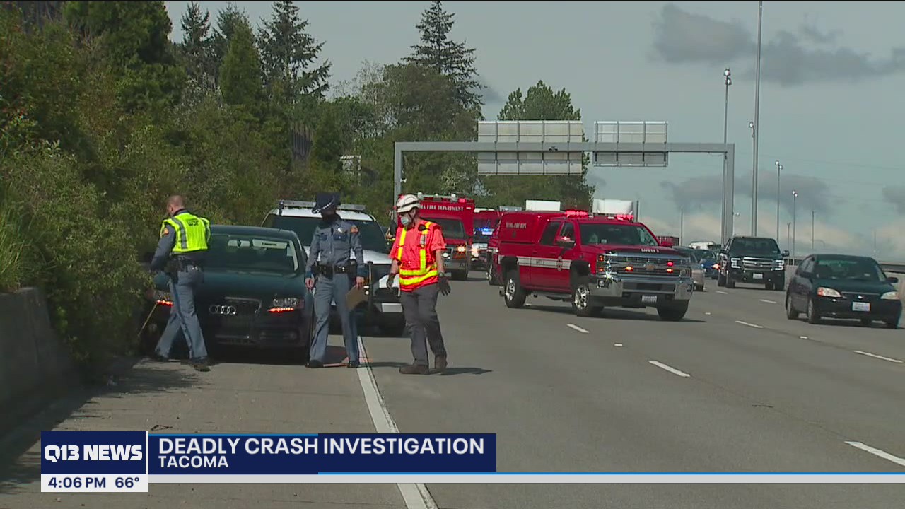 Woman arrested for vehicular homicide after hitting, killing person changing tire on I-5