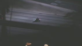 Motorcyclist weaves through Los Angeles traffic