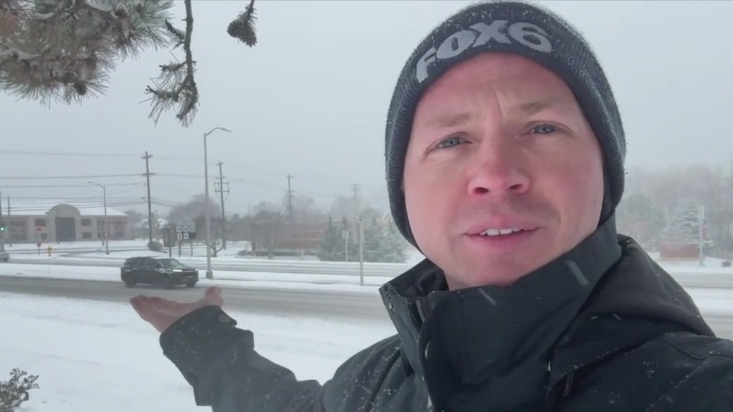 Bret Lemoine holds a car, and also talks about the weather