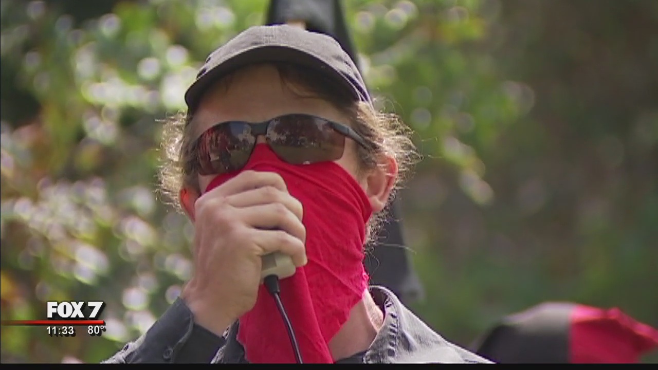 Two people arrested after downtown rally