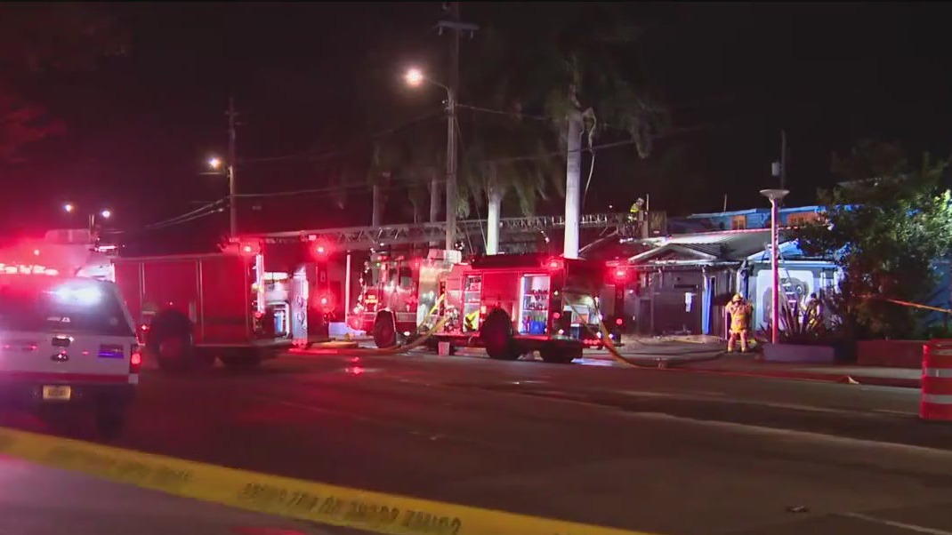 Two-alarm fire at former dog bar