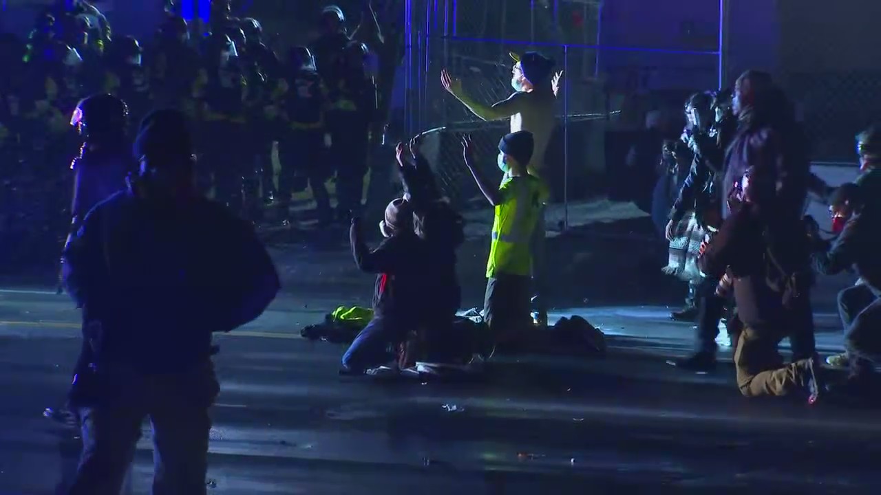 Police make arrests amid chaotic Brooklyn Center protest