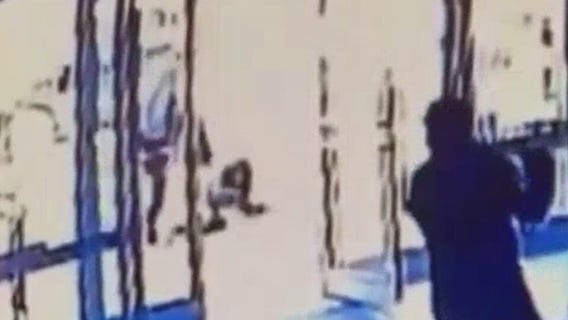 Asian woman brutally attacked in NYC as security guard watches and closes door