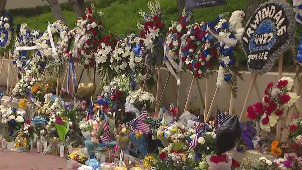 Memorial grows in Baldwin Park for slain police officer