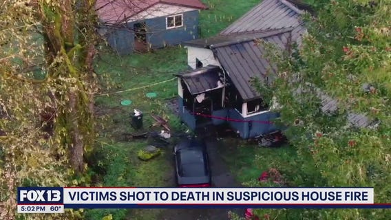 Victims shot to death in suspicious WA house fire