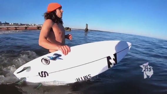Ocean City Winter Surf: Man surfs no matter what the weather, even in dead of winter