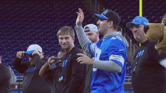 Children learn from the Lions at Inspire Change Football Clinic