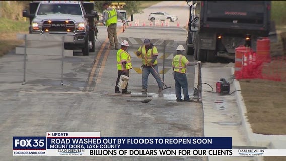 Road washed out by floods to reopen soon
