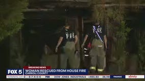 Woman rescued from house fire