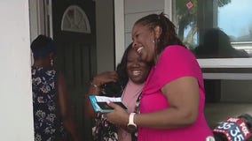 Woman given keys to her home she helped build