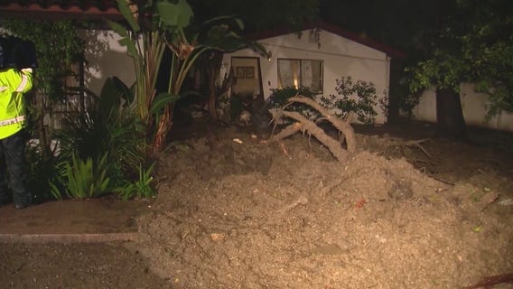 Mudslide slams into Encino home, others threatened