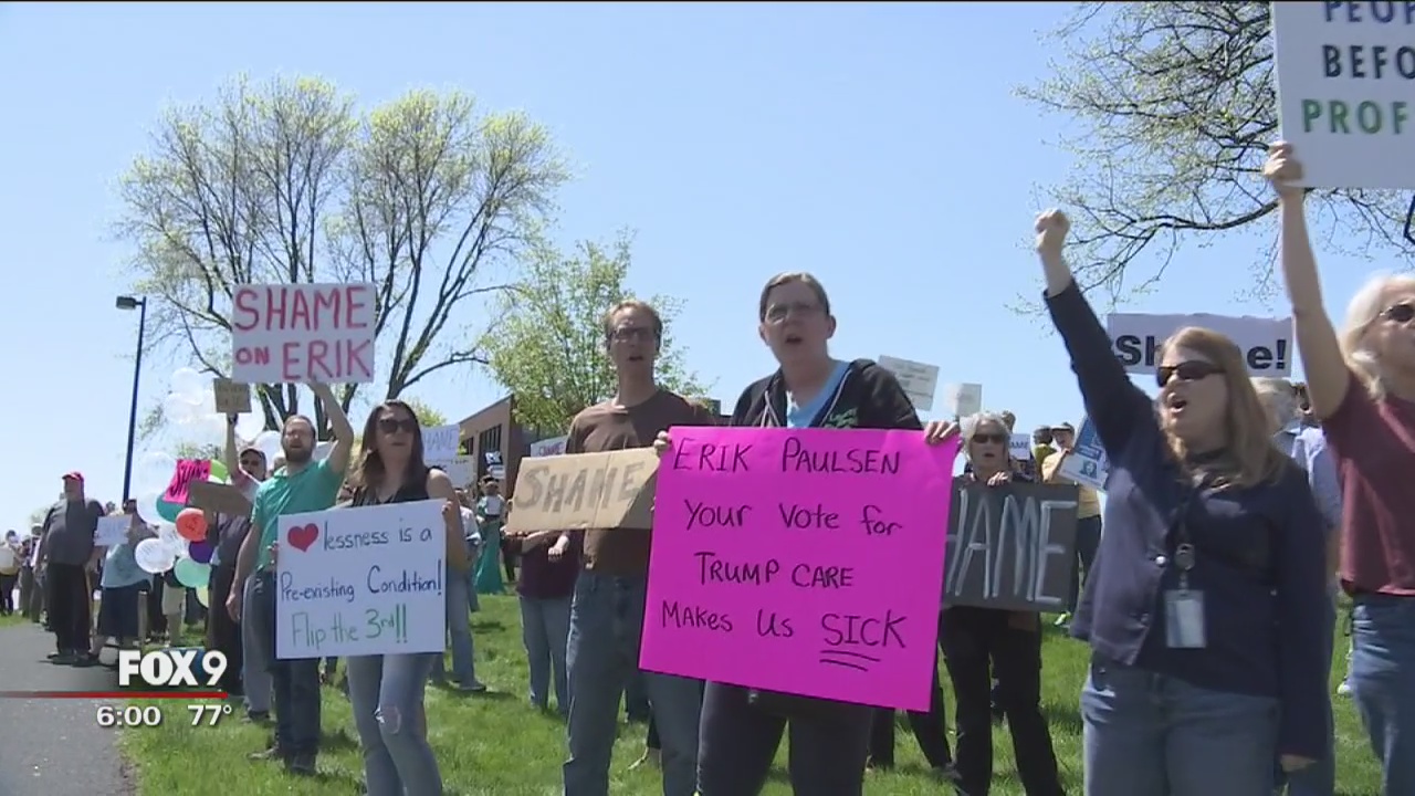 Protesters gather at Paulsen's office in response to health care vote