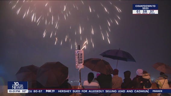 Philadelphia celebrates the New Year with fireworks despite the rain and fog