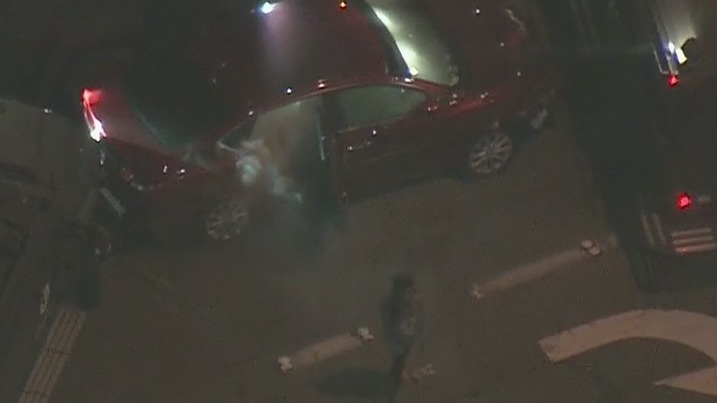 Young girl spotted coming out of car after hours-long standoff