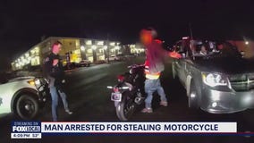 Motorcycle thief arrested pushing stolen, spray-painted bike