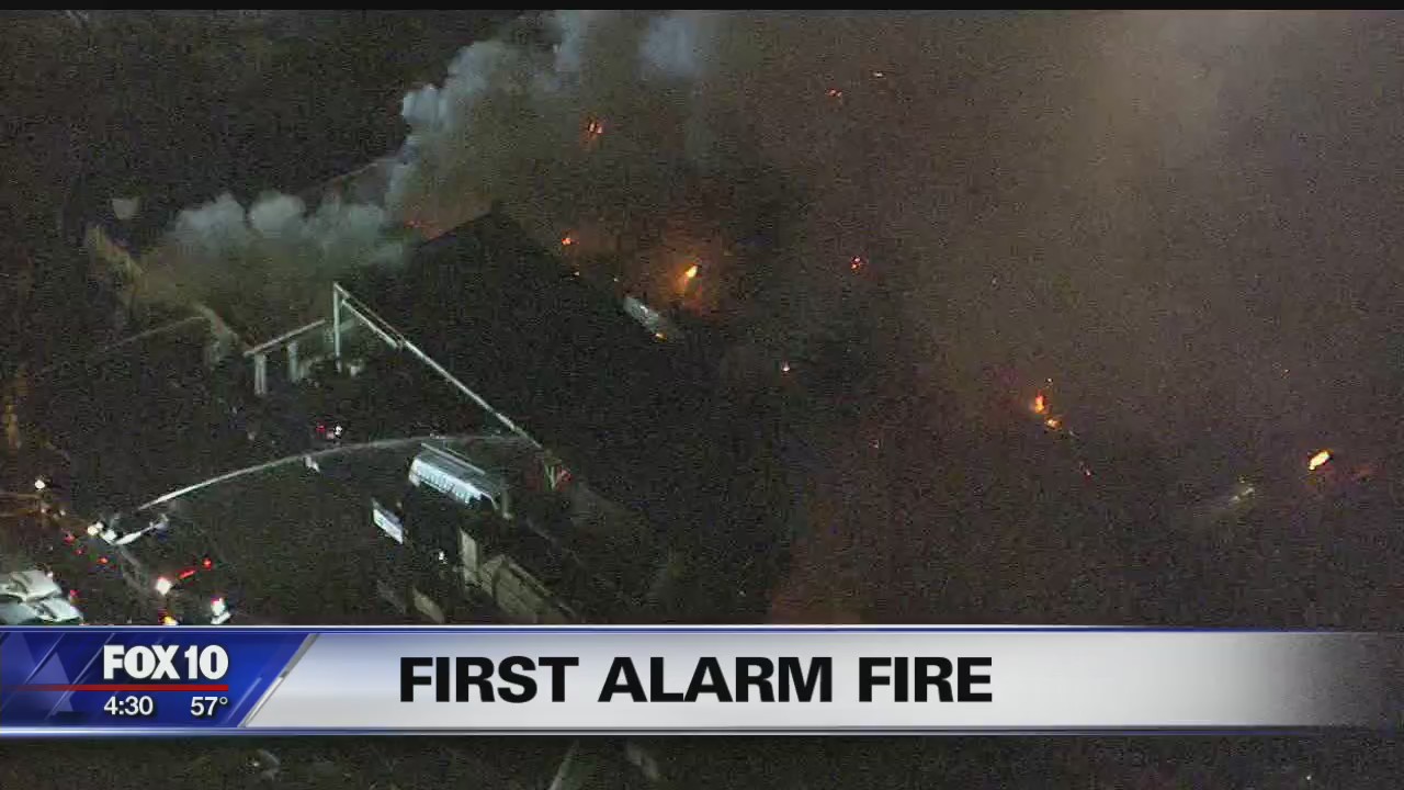 More than 60 firefighters respond to 1st-alarm auto body shop fire in ...