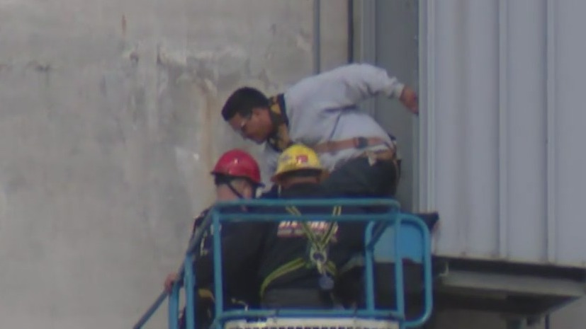 Chicago Fire Department rescues workers trapped on silo