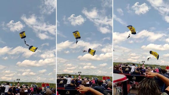 Navy parachutist hurt in hard landing during trick