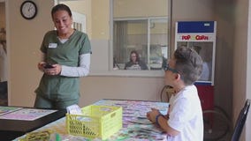 6-year-old makes bracelets
