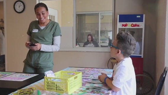 6-year-old makes bracelets