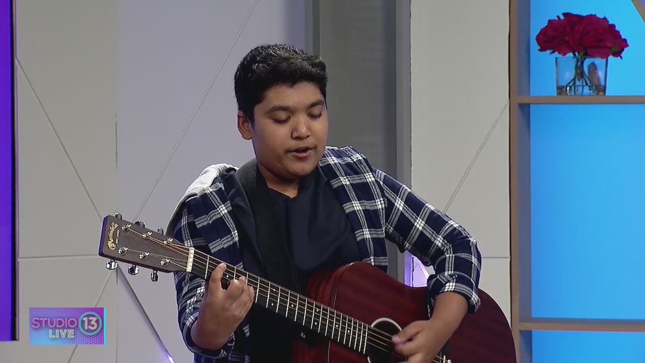 Seattle-based 13-year-old singer/songwriter performs during Sunday's Kraken game