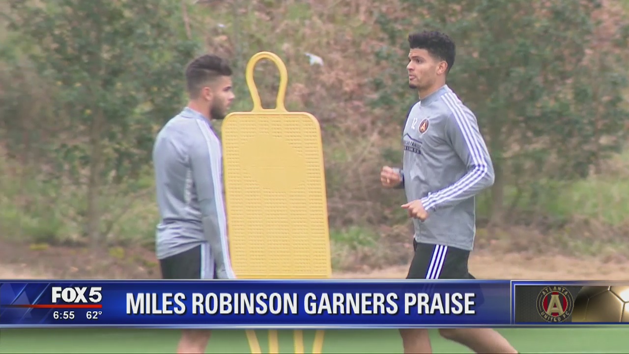 Miles Robinson garners praise