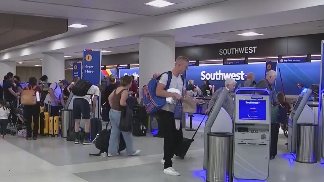 Southwest Airlines to charge for checked bags