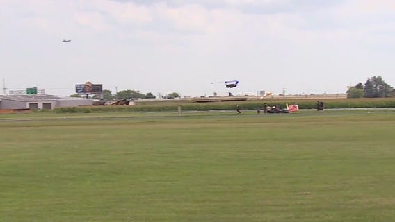 Skydiver lands in Sturtevant pond
