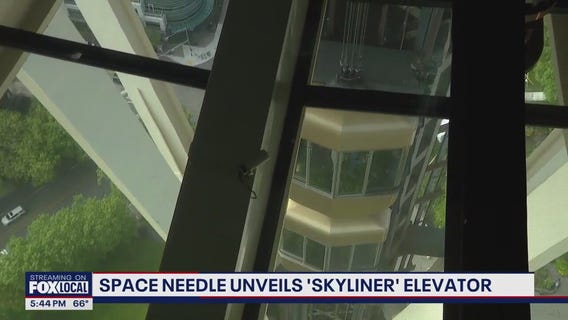 New Seattle Space Needle 'Skyliner' double-decker elevator lifts off
