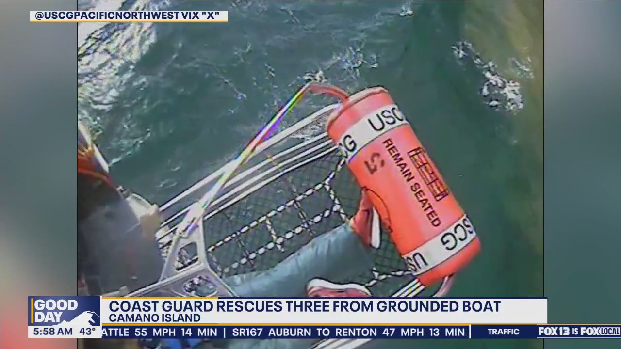 Coast Guard rescues three from grounded boat in WA
