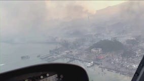 Travelers landing at O'Hare Airport after escaping Hawaii wildfires