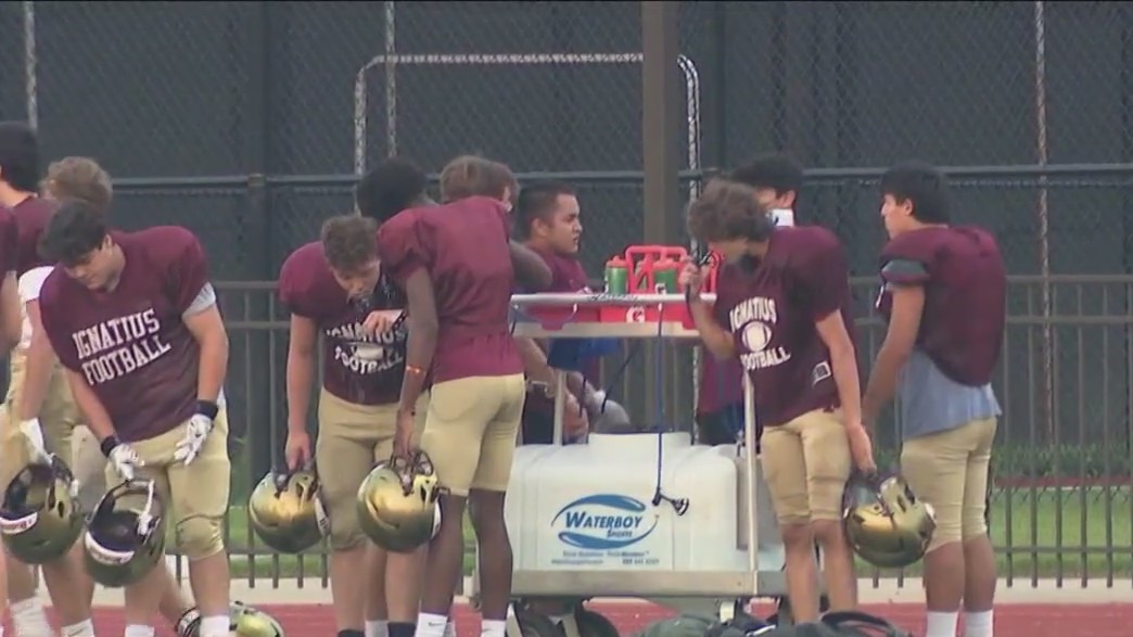High school athletes practice early to beat the heat