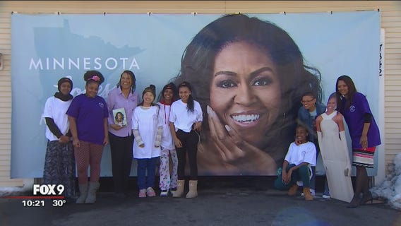 Minnesota woman puts Michelle Obama poster on home ahead of book tour stop