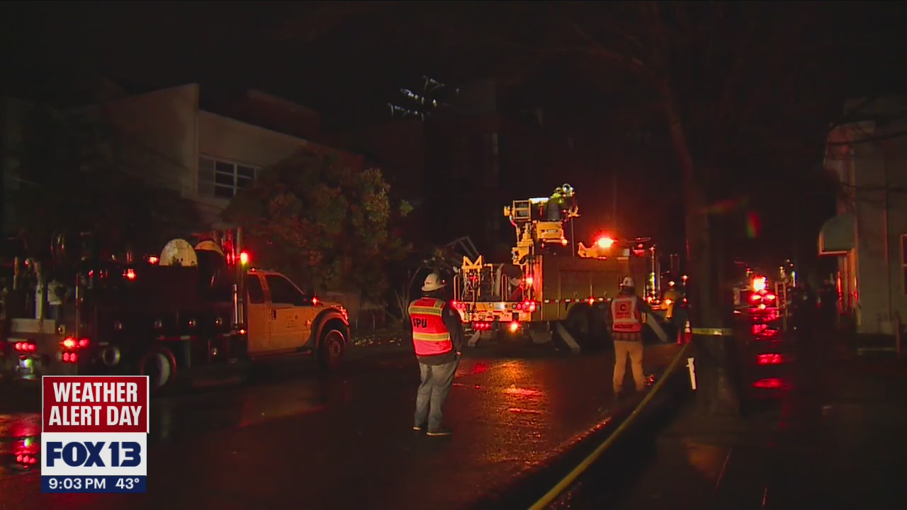 Power pole crashes into building in Seattle due to weather