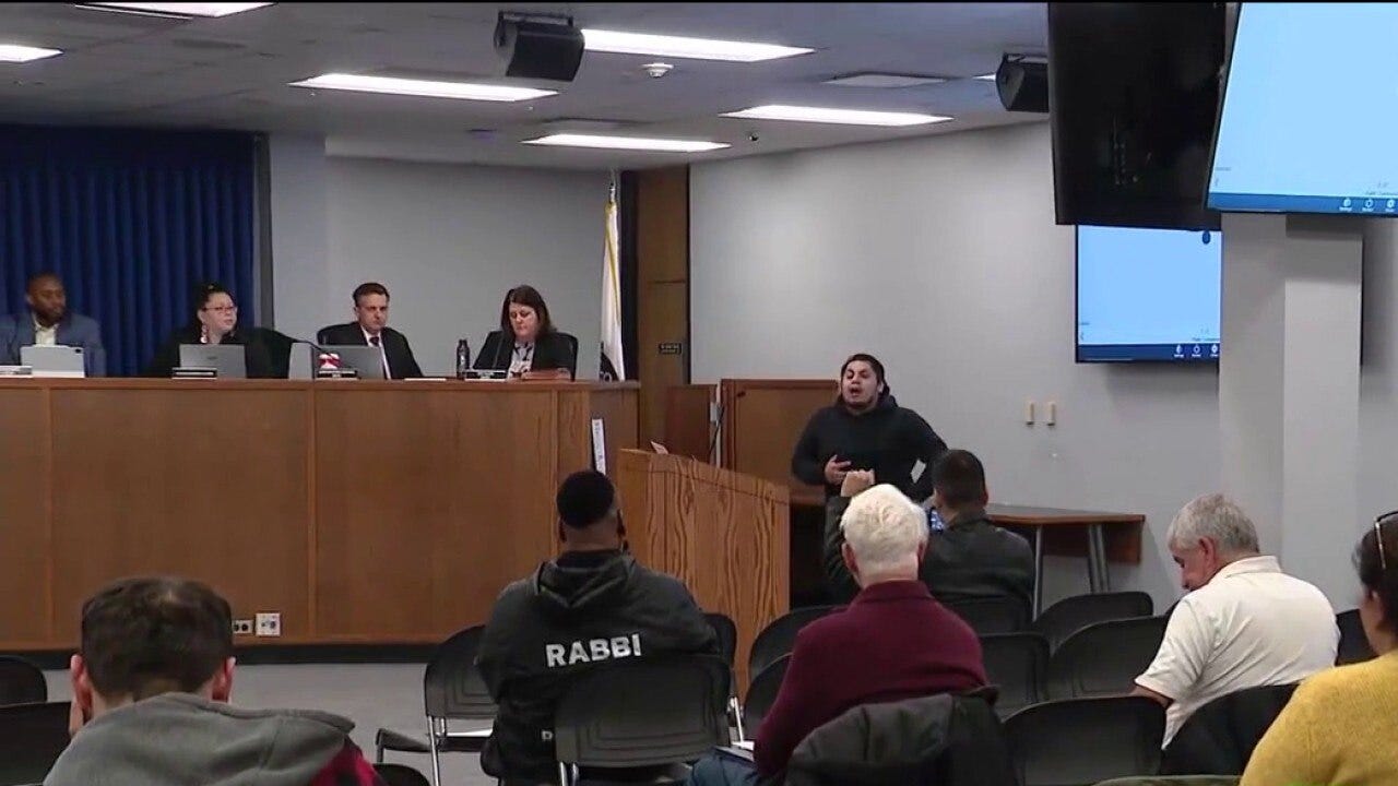Elgin residents protest ICE enforcement during City Council meeting