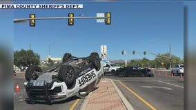 Pima County deputy's SUV flips upside down in collision