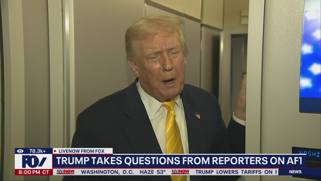 Trump takes questions from reporters on AF1