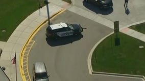 Suburban middle school placed on lockdown after report of gun inside building