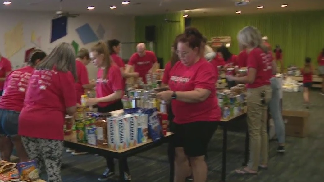 Keller Williams volunteers fix up activities center for foster kids, families