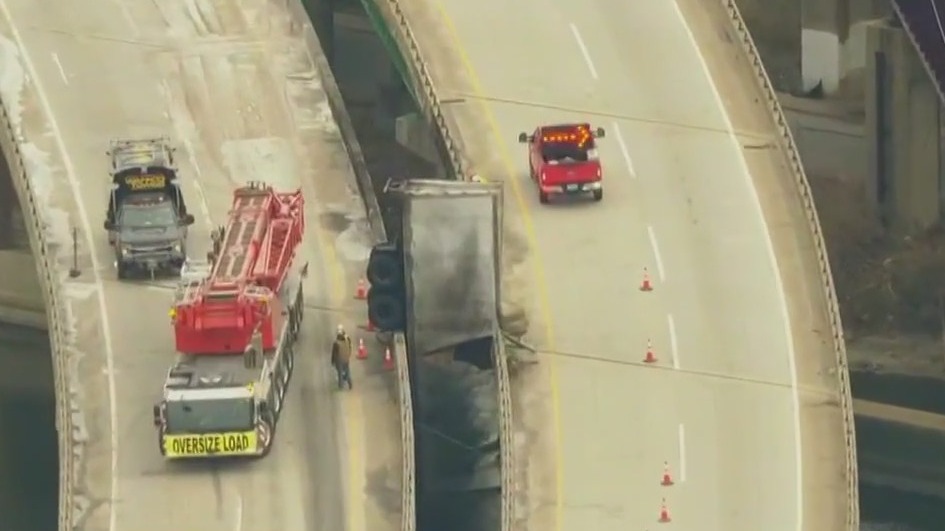 UPS driver found hanging onto bridge pillar after insane crash, Indiana State Police say