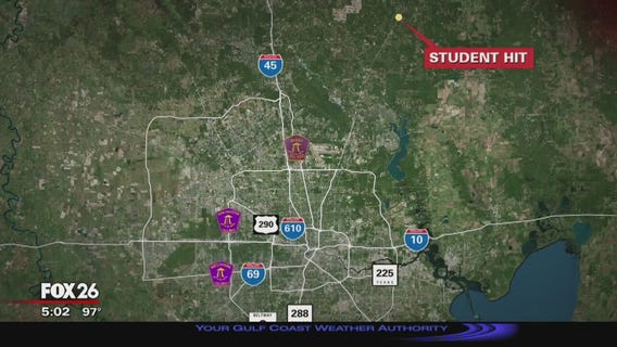 Child struck by vehicle after walking off bus