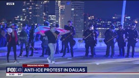 Dallas police blocking off bridge in Anti-ICE protest